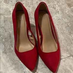 Red low heel pumps